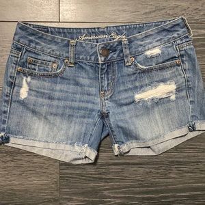 Size 0  (4 inch inseam). American Eagle denim jean shorts low rise